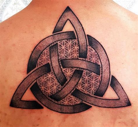 30 Amazing Triquetra Tattoos With Meanings Ideas And Triquetra Tattoo With Flowers - Triquetra Tattoo With Flowers