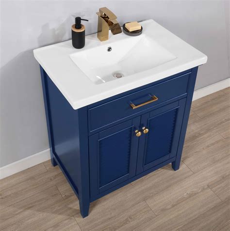 30in bathroom vanity with sink. The vanity comes with premium-quality hardware in a brushed nickel finish. Pre-assembled for easy installation, Kansas is available in widths of 18-in, 24-in, 30-in, and 36-in and a variety of finishes including white, dove gray, midnight blue and white oak. 20-in Undermount ceramic sink is pre-assembled to the vanity cabinet; Ceramic 