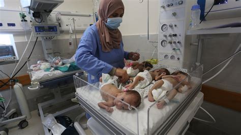 31 premature babies are evacuated from Gaza's largest hospital, but scores of trauma patients remain