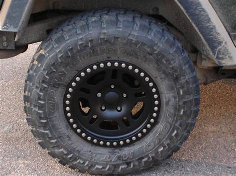 Set of 4 Tires and Wheels; 33x12.50R15,Pro Comp XMT2 Tires; 15x8 Pro Comp 97 Series Rock Crawler Wheels; 5 on 4.5 Bolt Pattern; Center caps and black lug nut kit included; Mounting and balancing included; TPMS sensors sold separately; Mounted tire and wheel packages are non-returnable; 1 year finish and structural warranty on wheels; Treadwear .... 