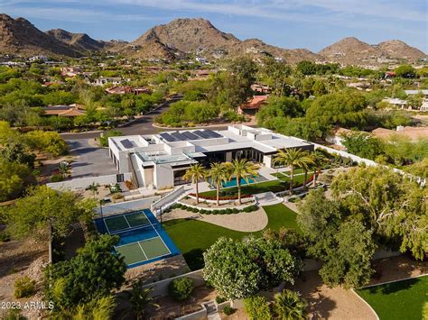 Magnificent modern contemporary home w/ 6 bedrooms plus, 6.5 baths completed with finest of design. The entrance boasts 16' ceilings w/ unobstructed views of the …. 