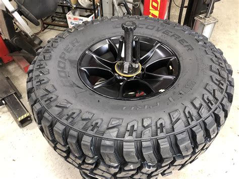 Check on National Tire and Wheel also. www.ntwonline.com Numerous places make a 36 or 37" mt tire for a 16" wheel. One tire I really like is the 36x15.50 Mickey Thompson MTZ. A wider 36 will look alot better than a 37x12.50 in my opinion. I have run many of these sizes before and i would recommend the 36x15.50R16 MTZs, if you have enough clearance.