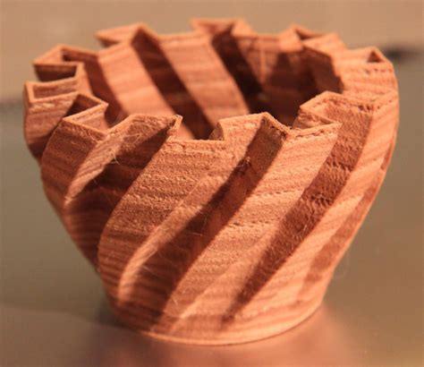3d print wood. Mar 7, 2024 · The primary role of 3D printing with wood lies in the unique aesthetic it imparts to the final products. The wood filament produces prints that closely emulate the grainy finish of pure wood, allowing for the creation of intricate designs and patterns that might be challenging with traditional woodworking methods. 