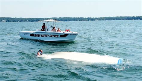 4 people helped out of Lake Geneva after canoe capsizes