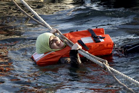 5 dead, including 4 children, in 2 migrant boat sinkings off Greek islands near Turkish coast