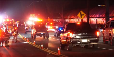 5 hospitalized after crash between train and semi-truck