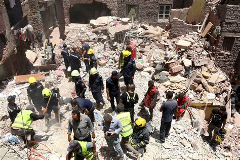 5-story apartment building collapses in Cairo, killing at least 9 people