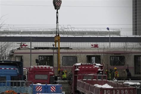 515 injured in a Beijing rail collision as heavy snow hits the Chinese capital