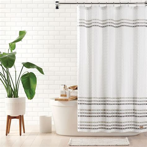 Enhance your bathroom's décor with the luxurious Wamsutta Fabric Shower Curtain Liner with Suction Cups. This versatile fabric liner includes practical side mounted suction cups and reinforced grommets for long-lasting functionality.Upgrade the look of your washroom with the resilient and luminous Wamsutta Fabric Shower Curtain Liner with Suction CupsFeatures practical side mounted suction ...