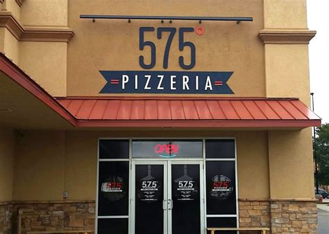 575 pizzeria. 575° Pizzeria All the way from the panhandle of Texas to the Dallas Fort Worth area, our Third location brings the magic of our award-winning pizza to Little Elm, Texas. Baked on stone, our hand made dough paired with the freshest of ingredients crafts a one of a kind pie. 