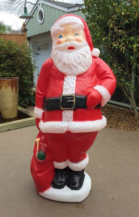 1. Mr. Christmas. Animatronic 122-in Santa Free Standing Decoration with Multicolor LED Lights. Model # 68065. Find My Store. for pricing and availability. 2. Holiday Living. 24-in Lighted Santa Blow Mold.. 