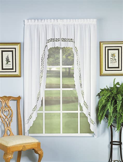 Decorate your windows with this graceful solid white swag pair, accented by an intricate crochet border. Perfect for country, traditional, farmhouse, or rustic decors. Each package includes 2 swags. Each swag is 29 inches wide by 30 inches long. The 2 swags side-by-side are 58 inches wide. Tier curtains shown are sold separately.