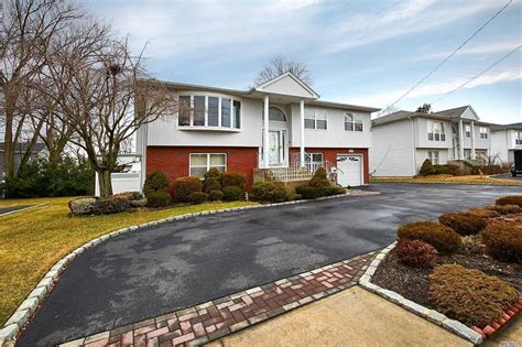 116 NEWBRIDGE RD EAST MEADOW, NY 11554. Off Market. SEE THIS HOME'