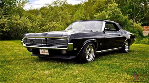 This 1969 Mercury Cougar XR7 was acquired by the seller’s father in 1999 and was refurbished in approximately 2001, after which it was acquired by the seller in 2007. The car was repainted in black over replacement black vinyl upholstery and it is powered by a 390ci V8 linked to a three-speed automatic transmission.. 