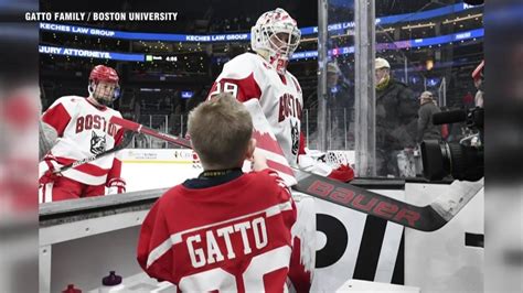 7-year-old Boston University hockey fan cheers team on at Frozen Four in Tampa Bay