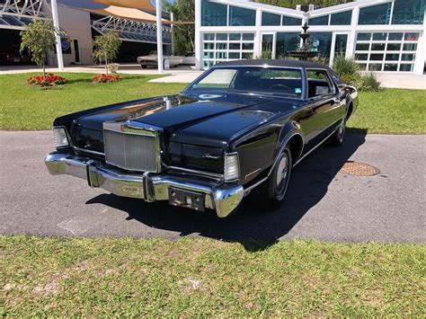 Witness Automotive Majesty: Unveiling the Timeless Elegance of the 1973 Lincoln Continental Mark IV