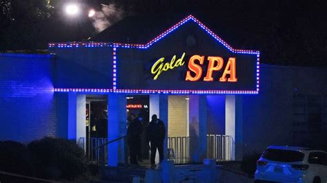 8 dead, man arrested after GA massage parlor shootings