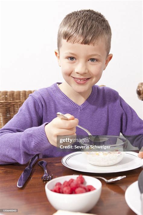 9,331 Boy Eating Breakfast Premium High Res Photos - Getty Images