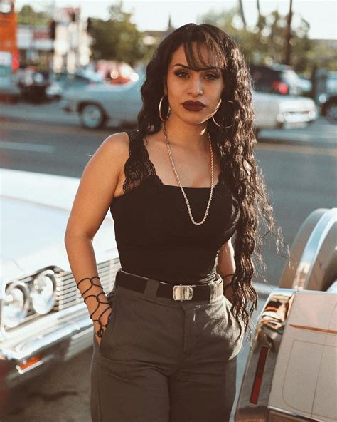 If you want to nail classic '90s style, take a page out of Afro-Venezuelan Mariah Carey's stylebook. From the natural curls, to the black bodysuit, to the belted jeans, and gold statement drop earrings, the entire look is throwback perfection. ... The half ponytail was a chola/Chicana/Latina hairstyle of choice in the '90s, sleek where it .... 