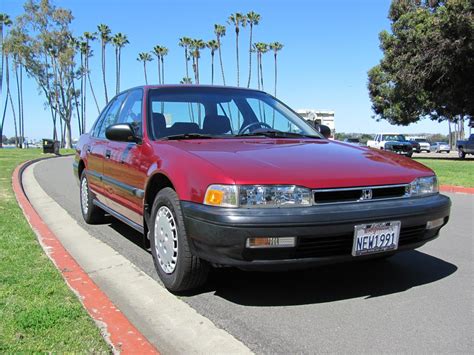 91 honda accord. Exterior Features. Rear Spoiler (Optional) Measurements. Base Curb Weight (lbs.) 3223. Tires & Wheels. Tires - Front Performance (Optional) Tires - Rear Performance (Optional) Compact Spare Tire. 