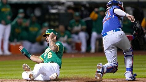 A’s rally for 4 in 10th, beat Rangers 9-7 on Rooker’s 3-run homer