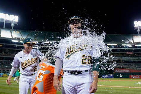 A’s walk off on Braves error for second straight win