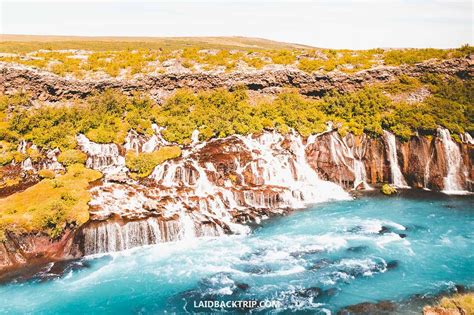 A Guide to Hraunfossar & Barnafoss Waterfalls in West …