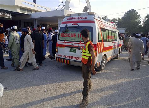 A bomb at a political rally in northwest Pakistan kills 10 people and wounds more than 50