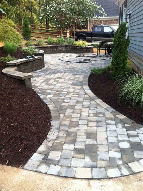 A brick paver patio on... - Bisel Land & Lake Services LLC