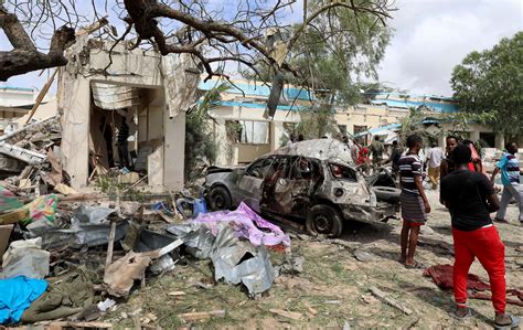 A car bombing at a Somali military facility kills 6 people, including 4 soldiers, police say