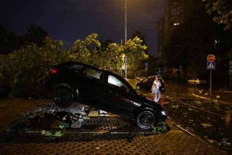 A child and a woman die in Serbia as a second deadly storm rips through the Balkans this week