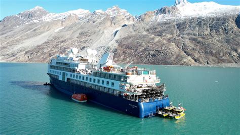 A cruise ship with 206 people onboard has run aground in Greenland