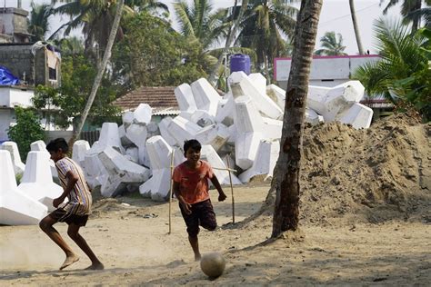 A cyclone-hit Indian hamlet pins its hopes on a sea wall