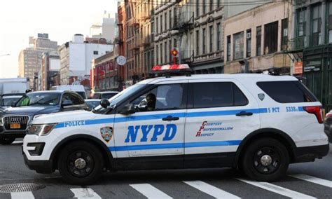 A driver fleeing New York City police speeds onto a sidewalk and injures 7 pedestrians