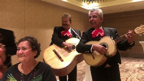A happy mariachi trio photos. .  ...