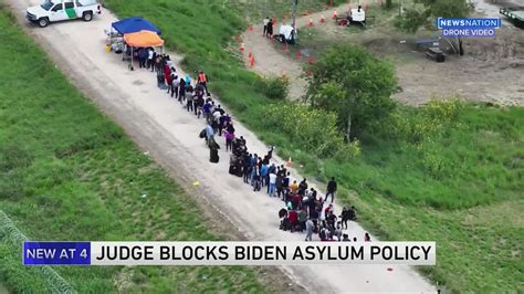 A judge blocks limits on asylum at US-Mexico border but gives Biden administration time to appeal