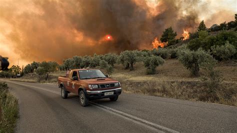 A major wildfire in northeastern Greece has forced the evacuation of villages and a city hospital
