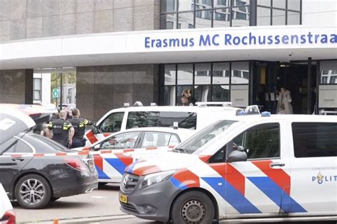 A man in military clothing has shot and wounded a person at a Dutch teaching hospital, police say