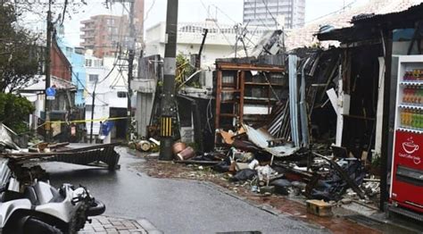 A powerful typhoon pounds Japan’s Okinawa and injures more than 30 people as it moves toward China