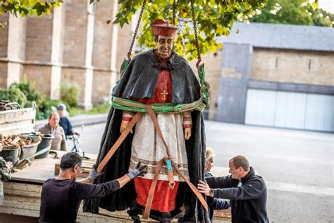 A statue of a late cardinal accused of sexual abuse has been removed from outside a German cathedral