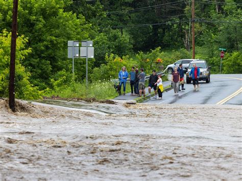 A surging river threatens Vermont’s capital as crews rescue more than 100 from swift water