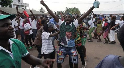 A vehicle rams into a victory celebration for Liberia’s president-elect, killing 2 and injuring 18