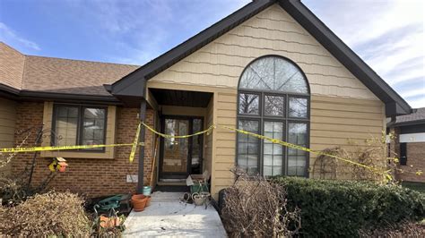 A woman shot with a crossbow and a priest stabbed in a rectory shake a small Nebraska town