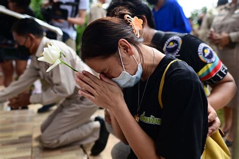 A year after Thai day care center massacre, a family copes with their grief