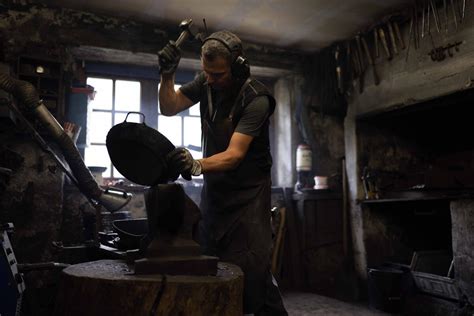 AP PHOTOS: Bavarian hammersmith forges wrought-iron pans at a mill more than 500 years old