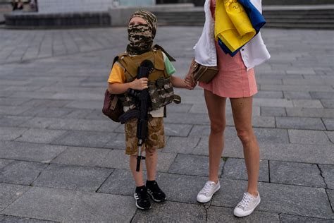 AP PHOTOS: Life in Kyiv may seem normal on the surface, but a closer look reveals the burdens of war