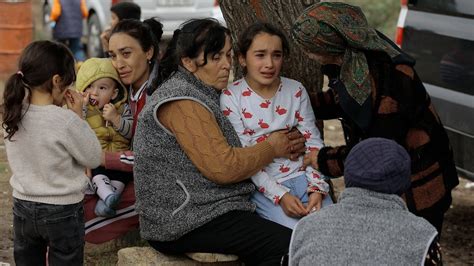 AP PHOTOS: Tens of thousands of Armenians flee in mass exodus from breakaway region of Azerbaijan