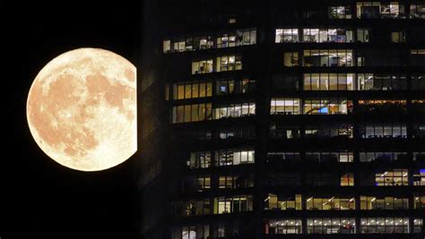 AP PHOTOS: The first supermoon in August rises around the world