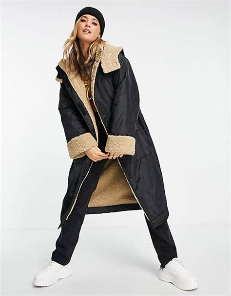 ASOS DESIGN borg lined oversized maxi rain coat in black ASOS