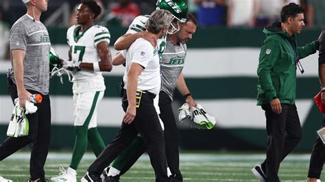 Aaron Rodgers hurts ankle in first series for Jets, is carted off sideline and ruled out of game